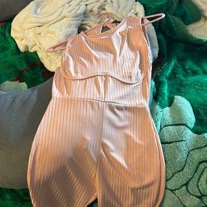 Cute pink romper! Never worn! Still has tag